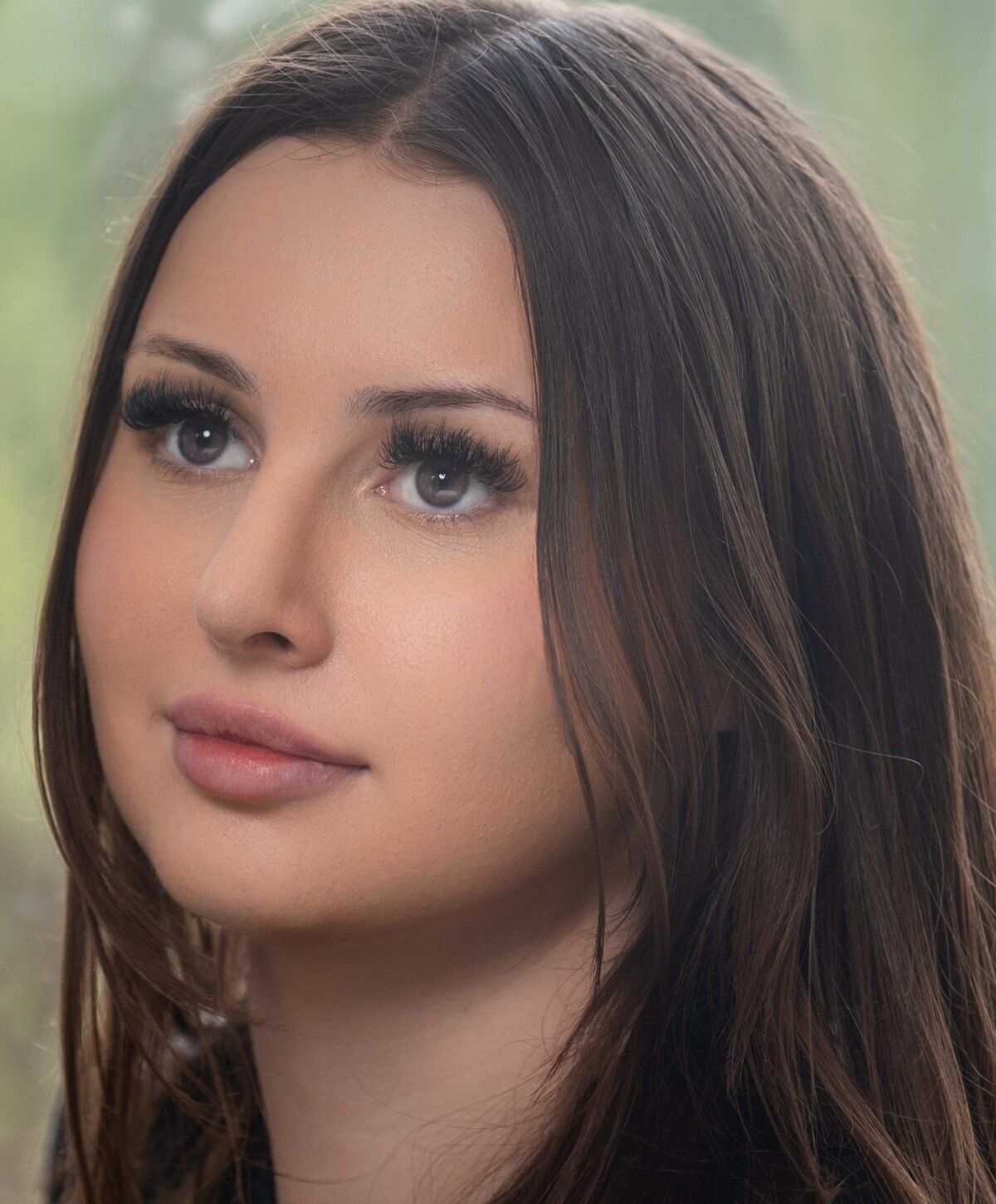 Close-up portrait of a woman with natural makeup.